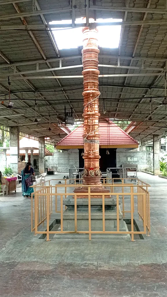 Copper coated dwajastambham at Kumbalgodu Ayyappa Temple