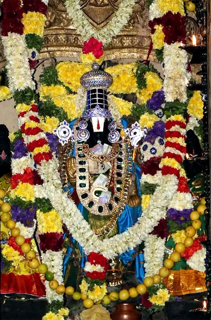 Nainamalai Varadaraja Perumal main deity alankaram with flower garlands and emerald jewelry Namakkal Tamil Nadu