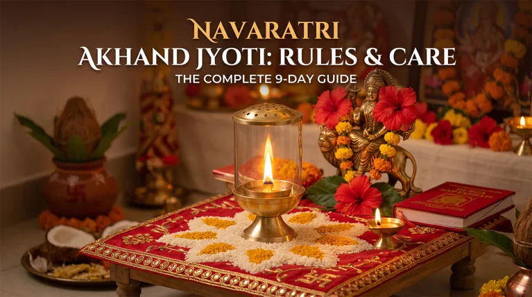 Traditional brass Navaratri Akhand Jyoti with a glass chimney placed on an Ashtadal rice lotus base on a consecrated puja chowki with an auxiliary diya.